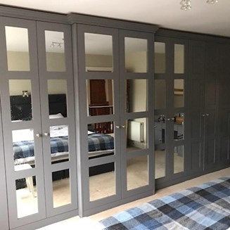 Image shows wardrobes with mirrors in Bray constructed by Darren Cranley Carpentry & Construction