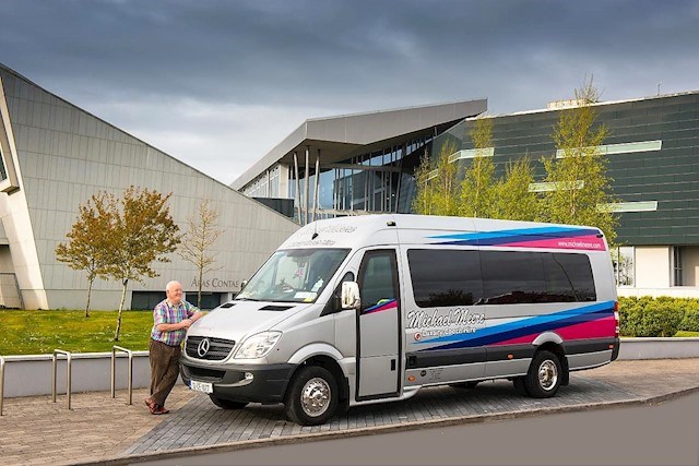 Image of Michael Meere Coach Hire minibus outside Shannon Airport, airport minibus hire to and from Ennis is provided by Michael Meere Coach Hire