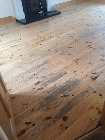 Image shows timber floor following sanding by Expert Floor Care.