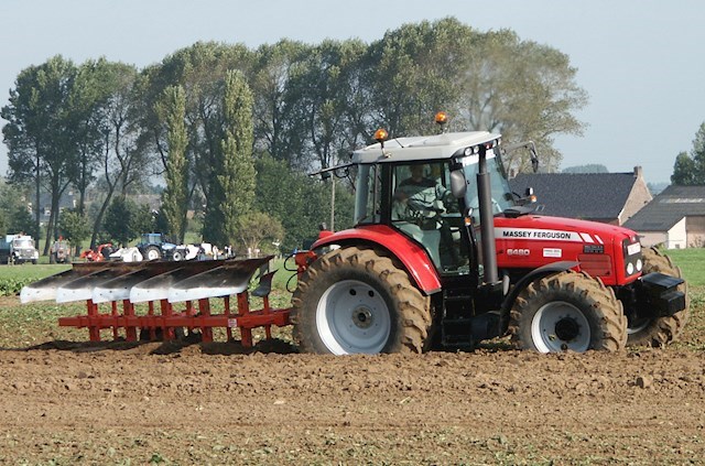 Image of Massy Ferguson Tractor 6480 ploughing field from C Gallagher Agri Contractor in Westmeath.