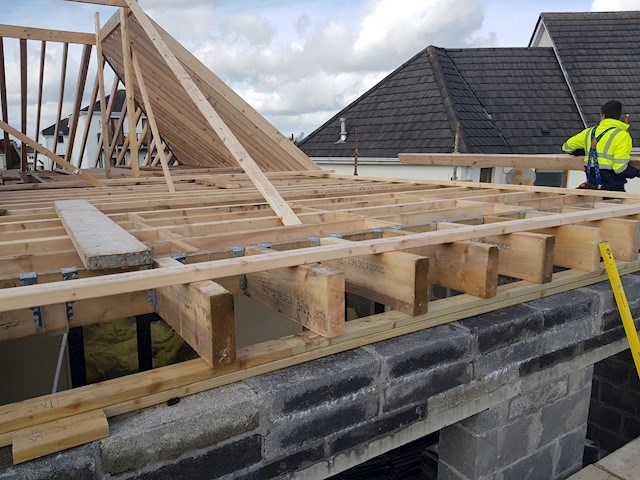 image of roof installation from MacPanel Design & Construction
