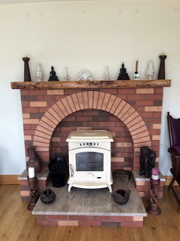 image of unique brick fireplace by Brendan Mullen
