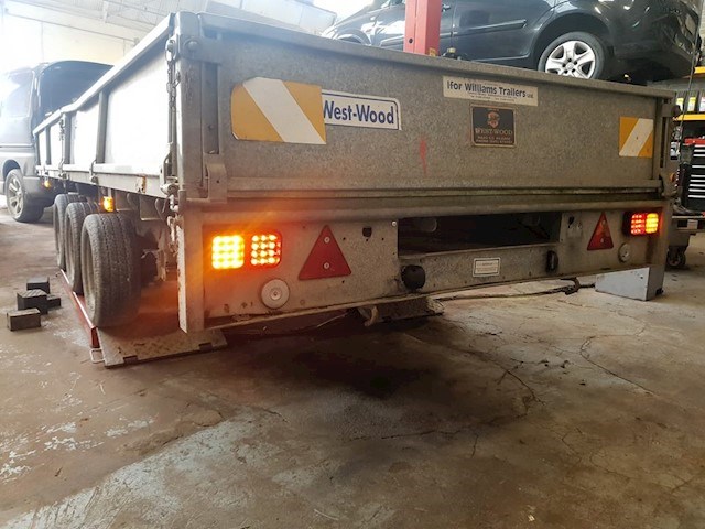 Image shows an Ifor Williams trailer being serviced by MK Trailer Servicing.