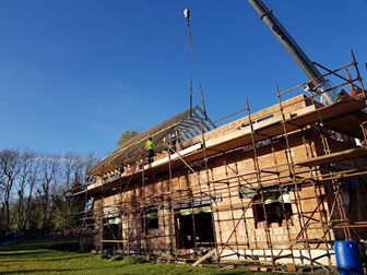 image of wooden roof installation from MacPanel Design & Construction