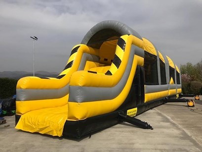 Image of Tom & Marie's Bouncy Castles inflatable obstacle course, inflatable obstacle course hire in Dunboyne, Dunshaughlin and Summerhill is available from Tom & Marie's Bouncy Castles