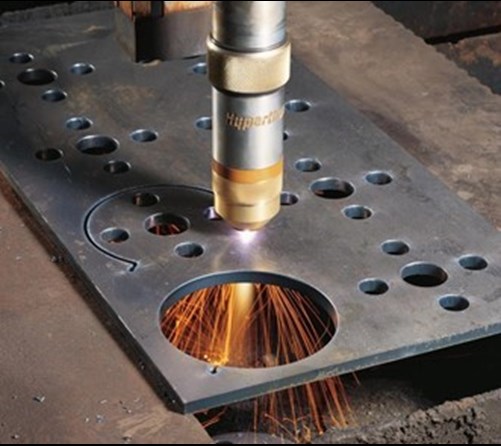 Plasma cutting circular holes in metal in Louth