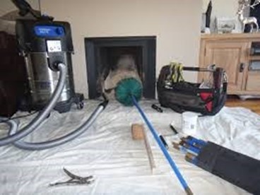 Image of chimney cleaning taking place from Allclean Chimey Sweeps in Tallaght.