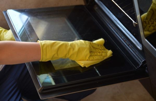 oven being cleaned