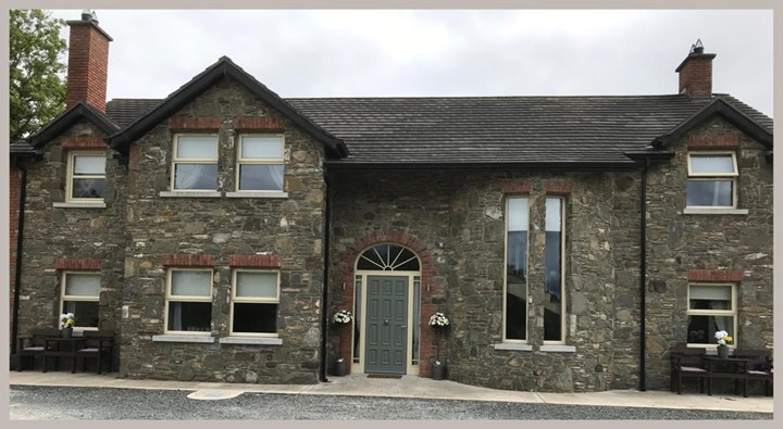 Image of stone faced house in Meath constructed by Robert Cotter