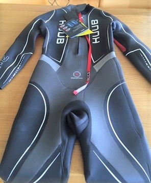 Image of wetsuit in Ireland with replaced panel by Fastnet Wetsuit Repair, wetsuit panel replacements in Ireland are carried out by Fastnet Wetsuit Repair